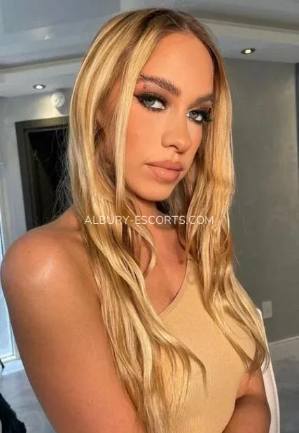 Albury escorts Selena — 3