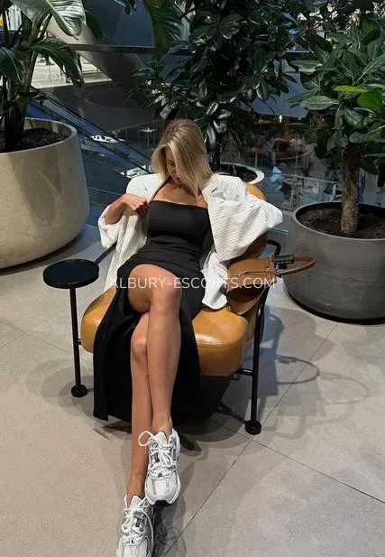 Albury escorts Caroline — 1