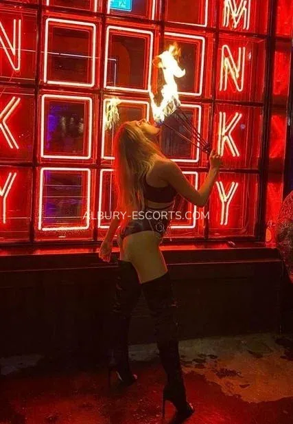 Albury escorts Diana — 5