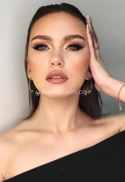 Albury escorts Reese — 2