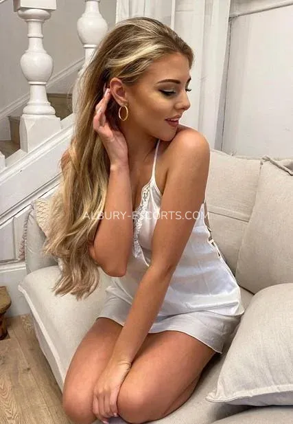 Albury escorts Selena — 9
