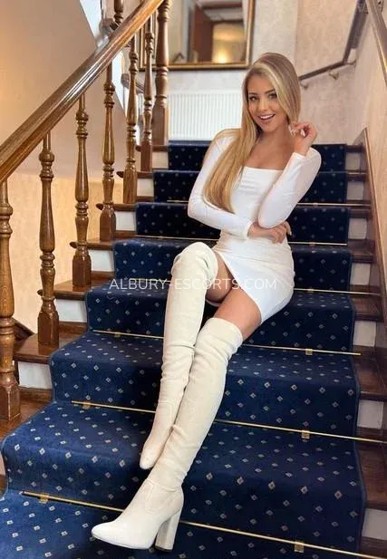 Albury escorts Selena — 1