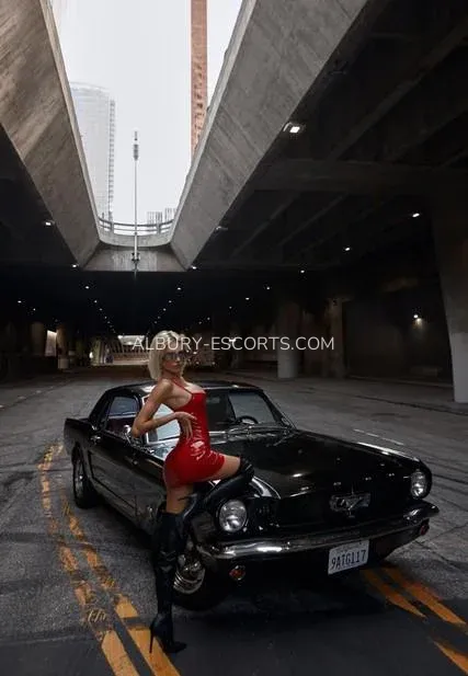 Albury escorts Margaret — 1