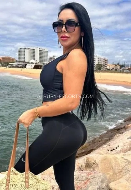 Albury escorts Bailey — 2