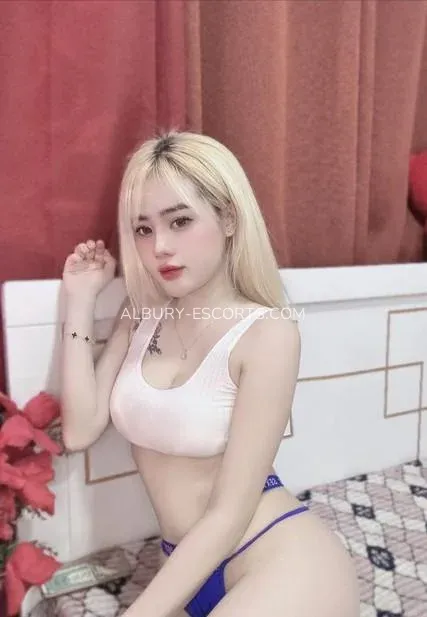 Albury escorts Selena — 1