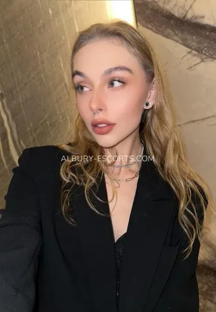 Albury escorts Christina — 8