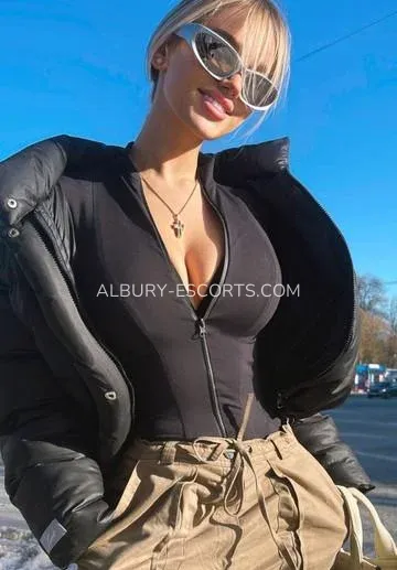Albury escorts Caroline — 4