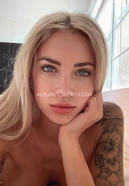 Albury escorts Natalie — 5