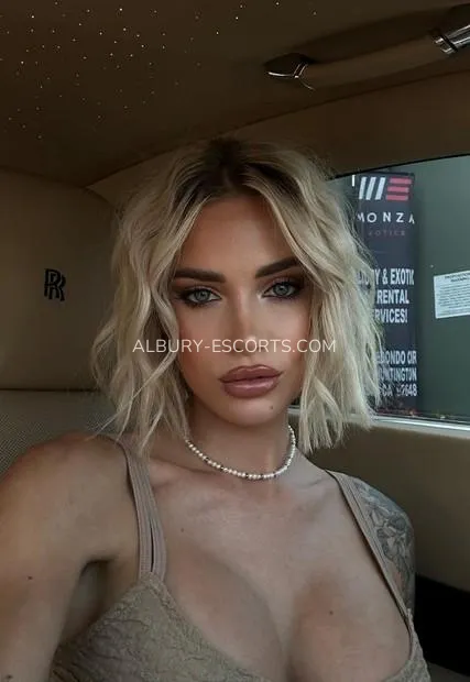 Albury escorts Margaret — 2