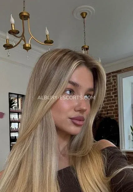 Albury escorts Kristin — 3