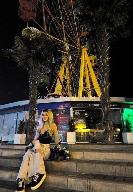 Albury escorts Julia — 1